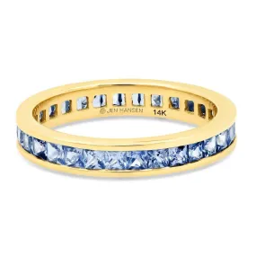 LIGHT BLUE SAPPHIRE CHANNEL SET RING, GOLD